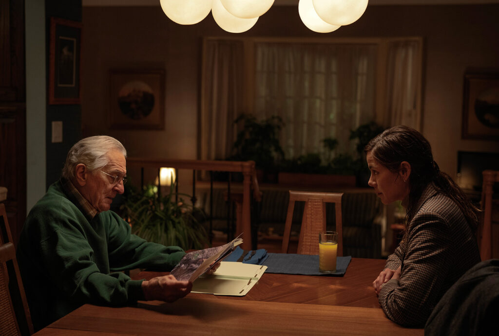A dimly lit dining room scene from